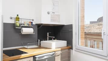 Fridge, microwave, stovetop, coffee/tea maker