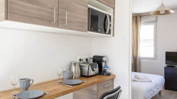 1 slaapkamer, een strijkplank/strijkijzer, reisbedje, gratis wifi
