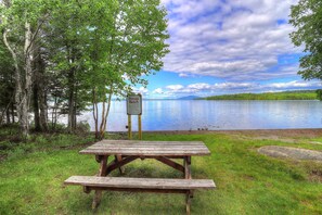 Outdoor dining - Lakehouse Condo 3B | Shared Beach Access on Rangeley Lake (Rangeley)