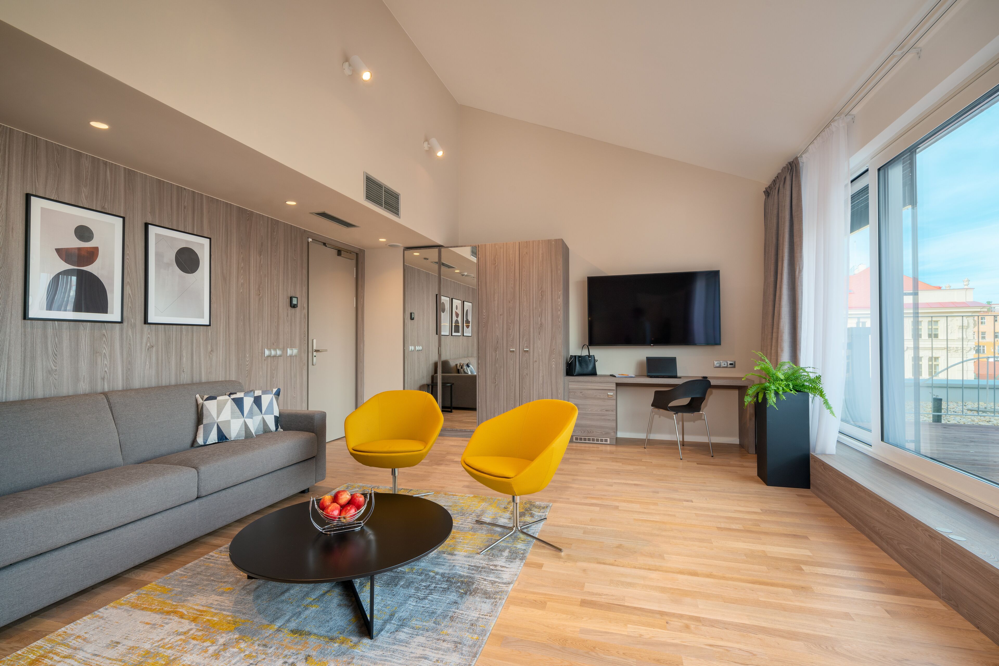 deluxe apartment, terrace | living area | 43-inch flat-screen tv with satellite channels, tv