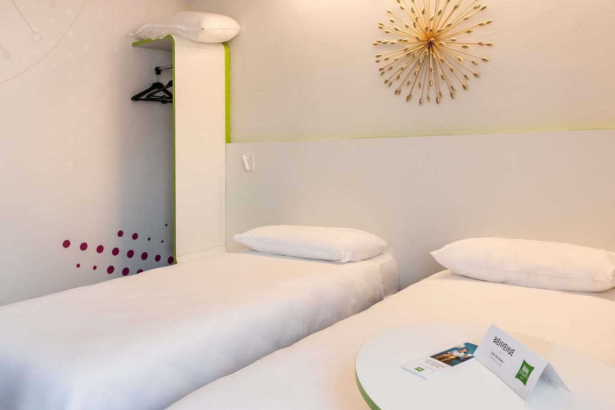 Premium bedding, pillowtop beds, blackout drapes, soundproofing