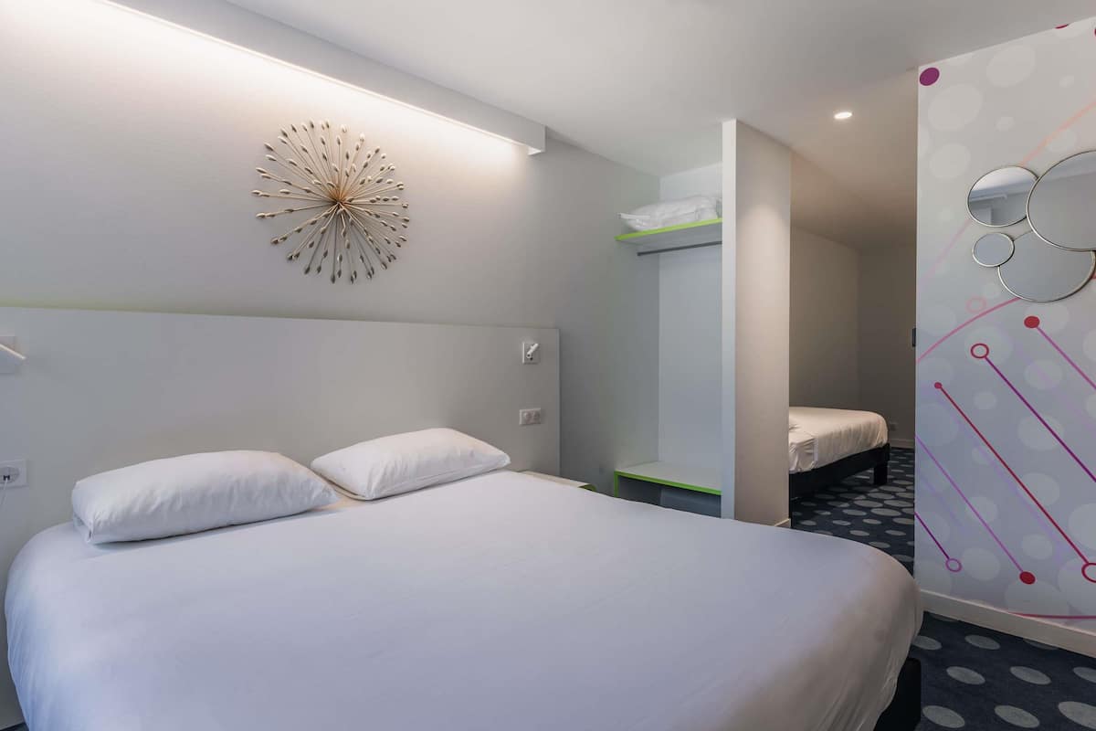 family suite | premium bedding, pillow-top beds, blackout curtains, soundproofing