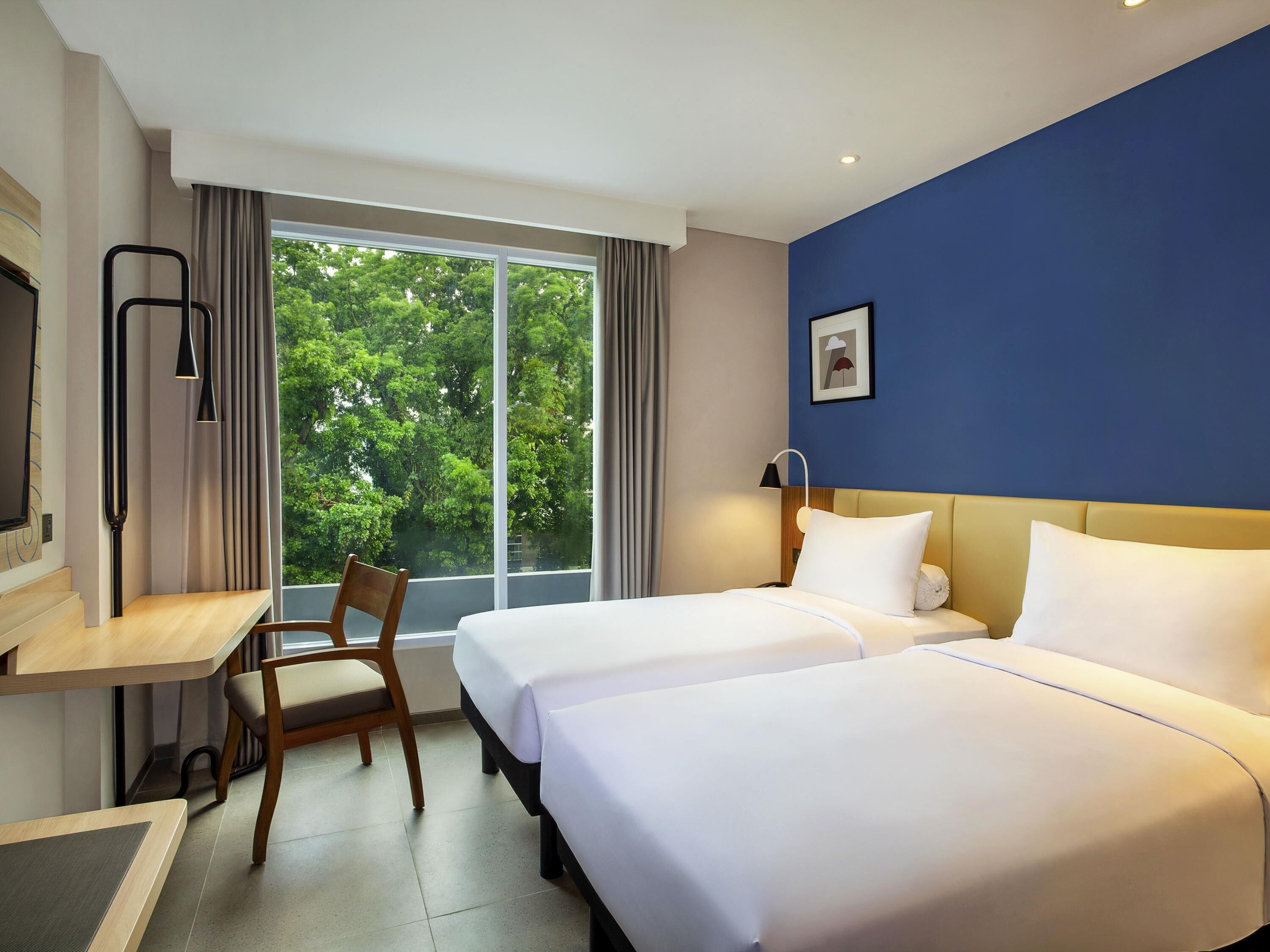 Deluxe Room, 2 Twin Beds | Desk, laptop workspace, cribs (free), WiFi (free)