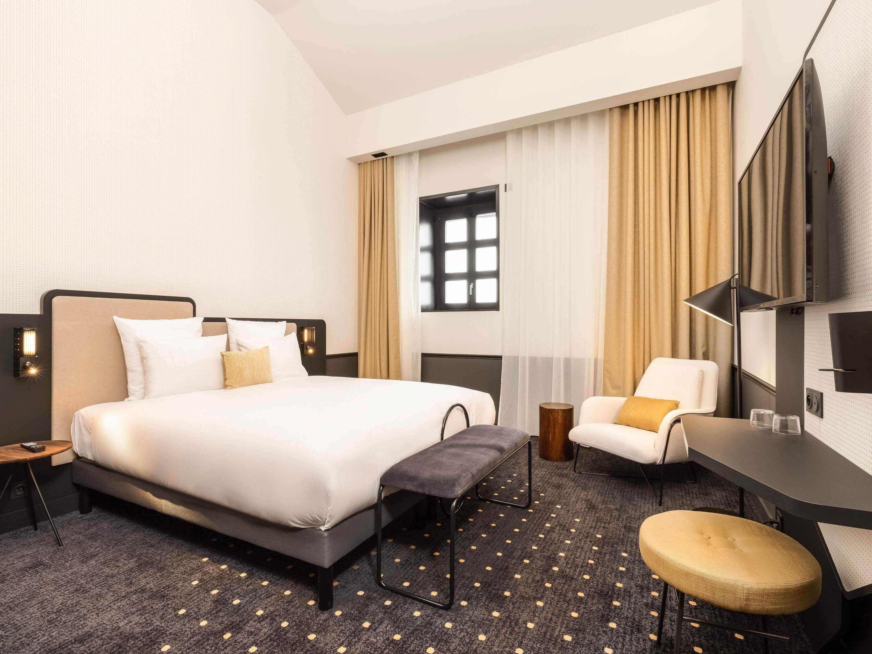 Luxe beddengoed, pillowtop-bedden, een kluis op de kamer, een bureau