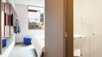 Desk, laptop workspace, free WiFi, bed sheets