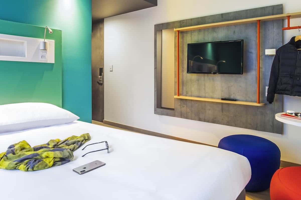 Desk, laptop workspace, free WiFi, bed sheets