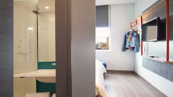 Desk, laptop workspace, free WiFi, bed sheets