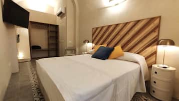 2 habitaciones, tabla de planchar con plancha, wifi y ropa de cama