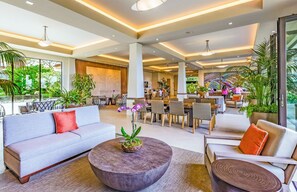 Relax in our inviting lobby with comfortable seating, a coffee table, and dining area.