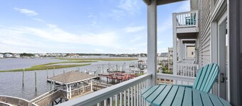 "All About the Views" is ON THE WATER - one block walk to the Beach Side!