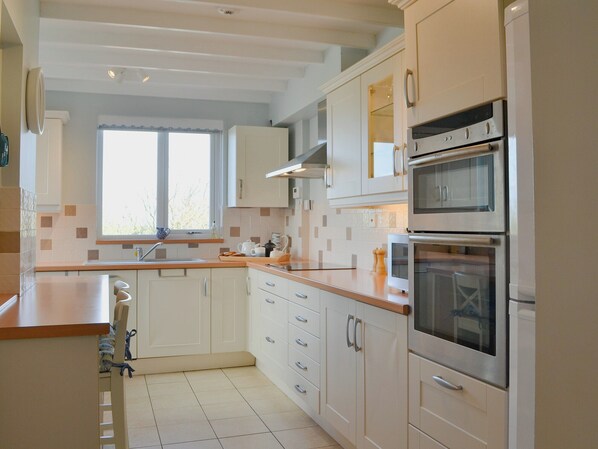 Dishwasher, high chair, cookware/dishes/utensils