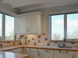 Astianpesukone, syöttötuoli