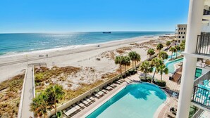 A beachfront hotel with a swimming pool, beach access, and ocean views. - The Oasis 409 | Spacious, Lazy River, Poolside Grill, New Splash Pad, Pool with Slide! (Orange Beach)