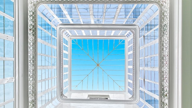 A room with a large skylight, white walls, and a patterned floor. - Genteel Home Plaza de España II (Cadiz)