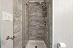 Bathtub, hair dryer, towels