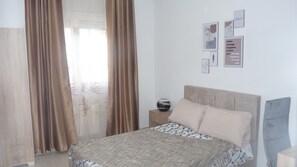 2 chambres, fer et planche à repasser, accès au Wi-Fi (inclus)