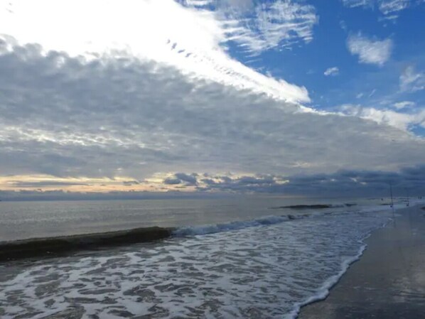 On the beach, sun-loungers