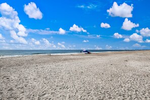 On the beach, sun loungers