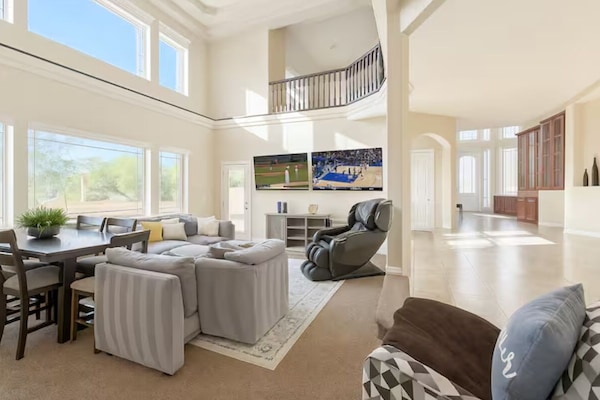 Smart TV, fireplace, books, stereo