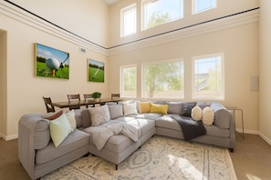 Smart TV, fireplace, books, stereo