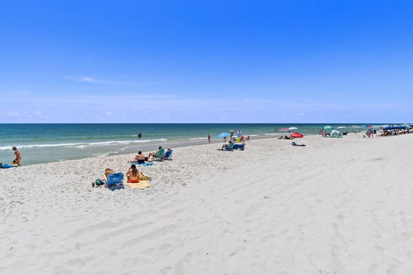 Guests can enjoy a relaxing beach experience with access to the calm sea and scenic views.