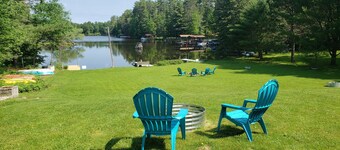 Clean cottage on the Eagle River Chain, dock, firewood, edge of town