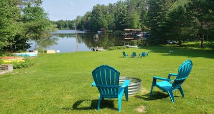 Clean cottage on the Eagle River Chain, dock, firewood, edge of town