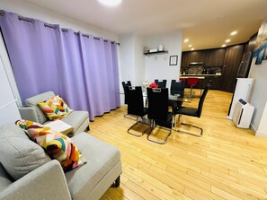 Luxury House | Living room | 60-inch Smart TV with cable channels, TV, fireplace