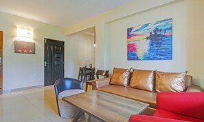 Deluxe Double Room, Balcony | Desk, iron/ironing board, free WiFi, bed sheets - Treebo Aquamarine Arpora With Pool (Arpora)