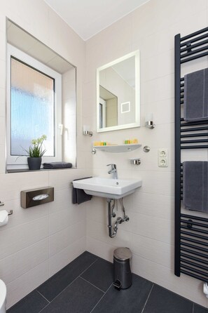 Hair dryer, towels, soap, toilet paper