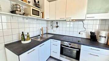 Fridge, microwave, oven, dishwasher