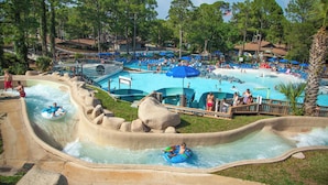 A water park with multiple pools, slides, and a lazy river.