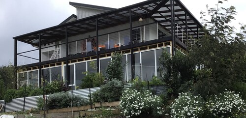 Art House.Paintings in hallway, bathroom, toilet, living areas and bedrooms. 