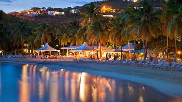 On the beach, sun loungers