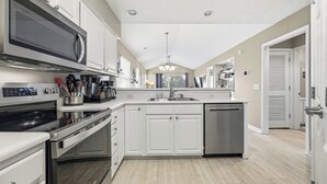 Private kitchen - TB 19E Eagle's Nest Beautiful three bedroom condo located in True Blue (PAWLEYS ISLAND)