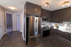 Fridge, microwave, oven, stovetop - Beautiful Laneway home by WEM with garage & AC (Edmonton)
