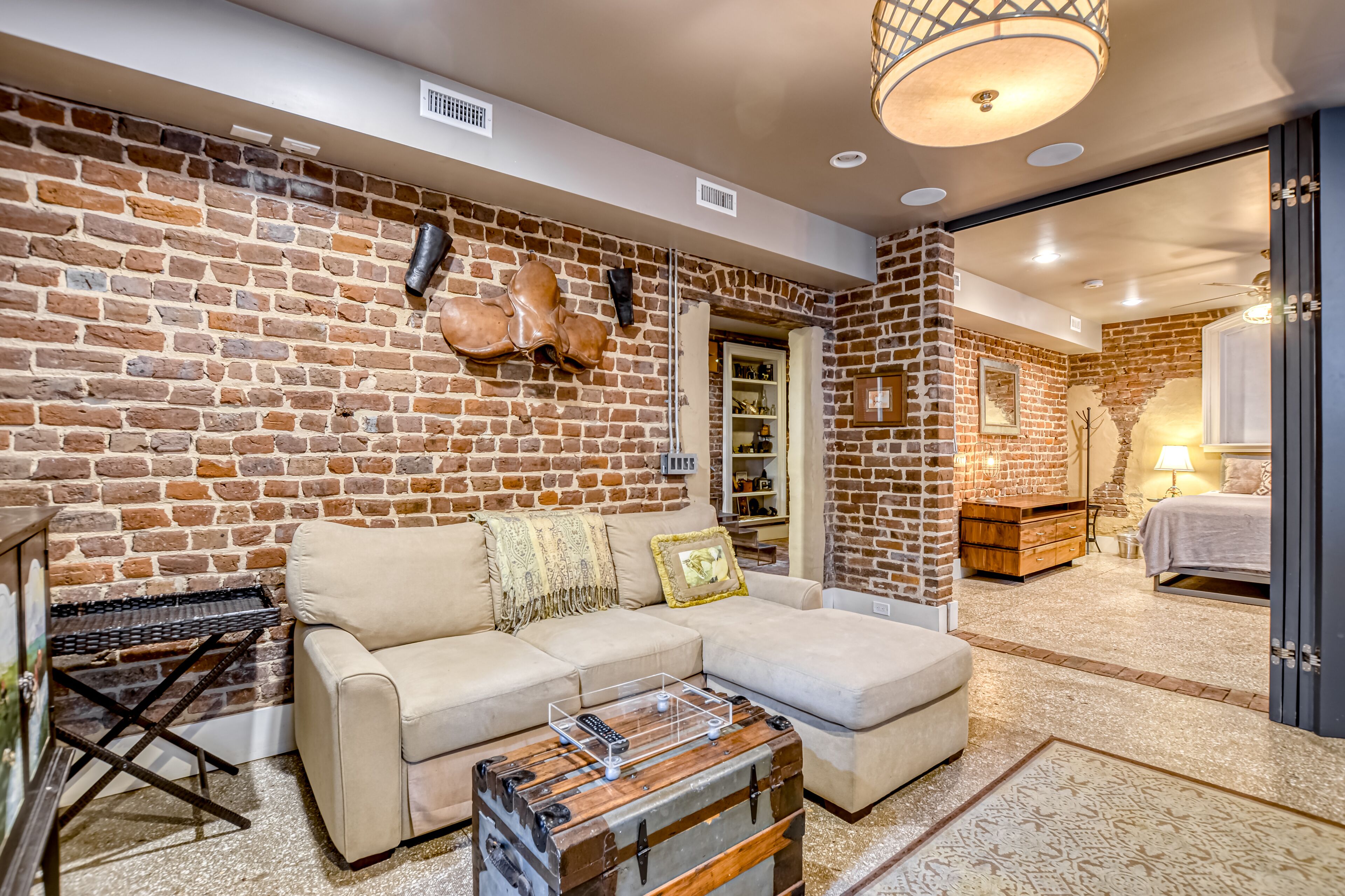 Industrial-Chic, Garden-Level Apartment in an 1850s Historic District Mansion