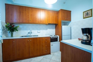 Apartment | Private kitchen | Fridge, microwave, oven, stovetop
