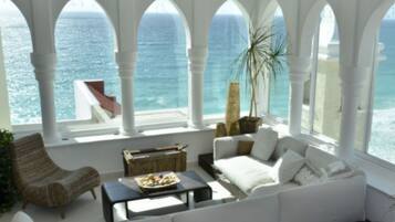 Exclusive Apartment | Living room | Flat-screen TV, heated floors