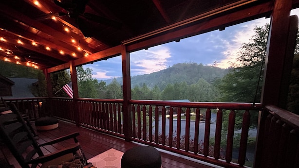 A wooden deck with a view of a forested mountain range. - LITTLE CUBBIE Location! Views! Pool!! (Sevierville)
