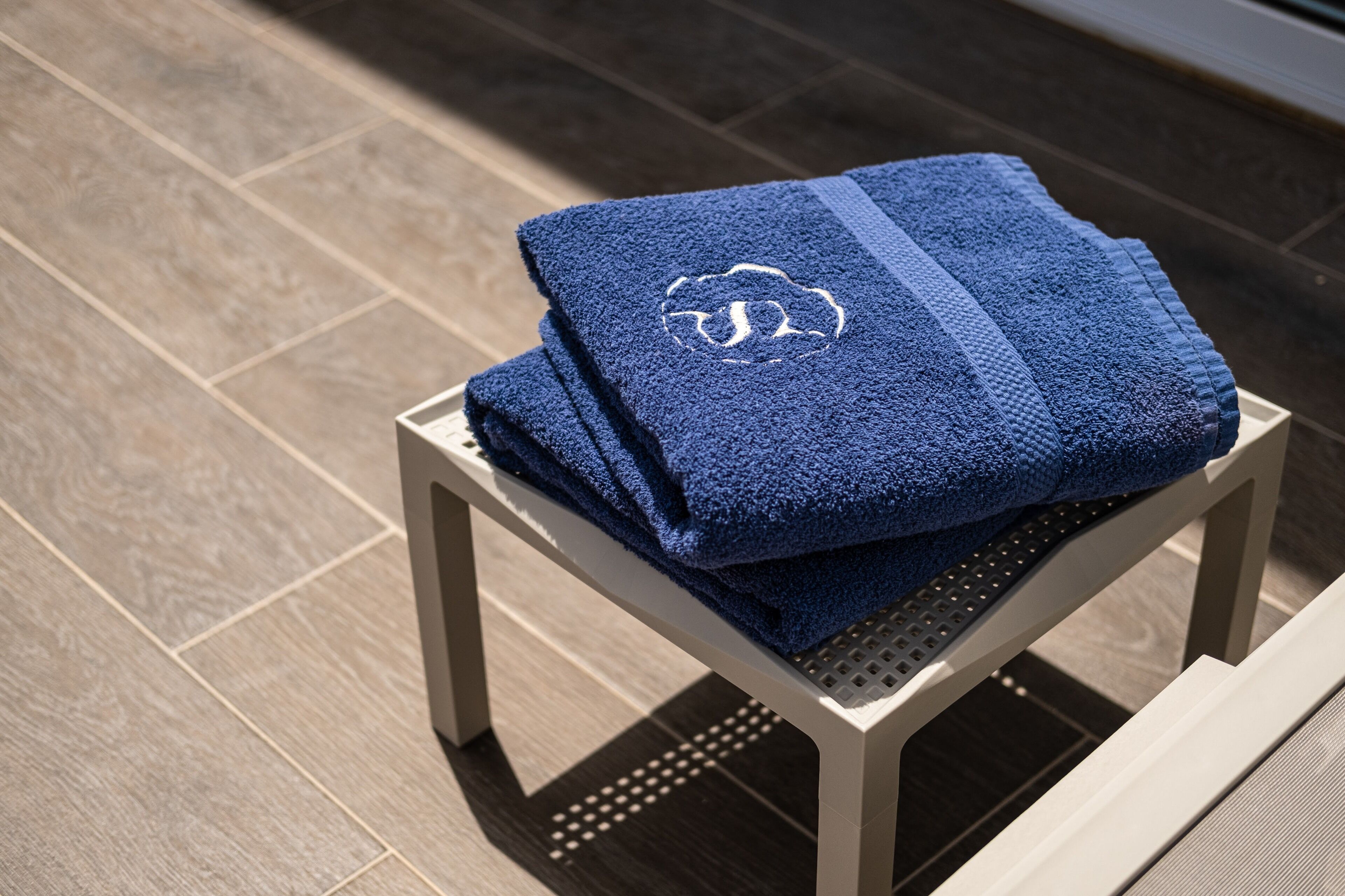 seasonal outdoor pool, open 8:00 am to 8:00 pm, pool umbrellas