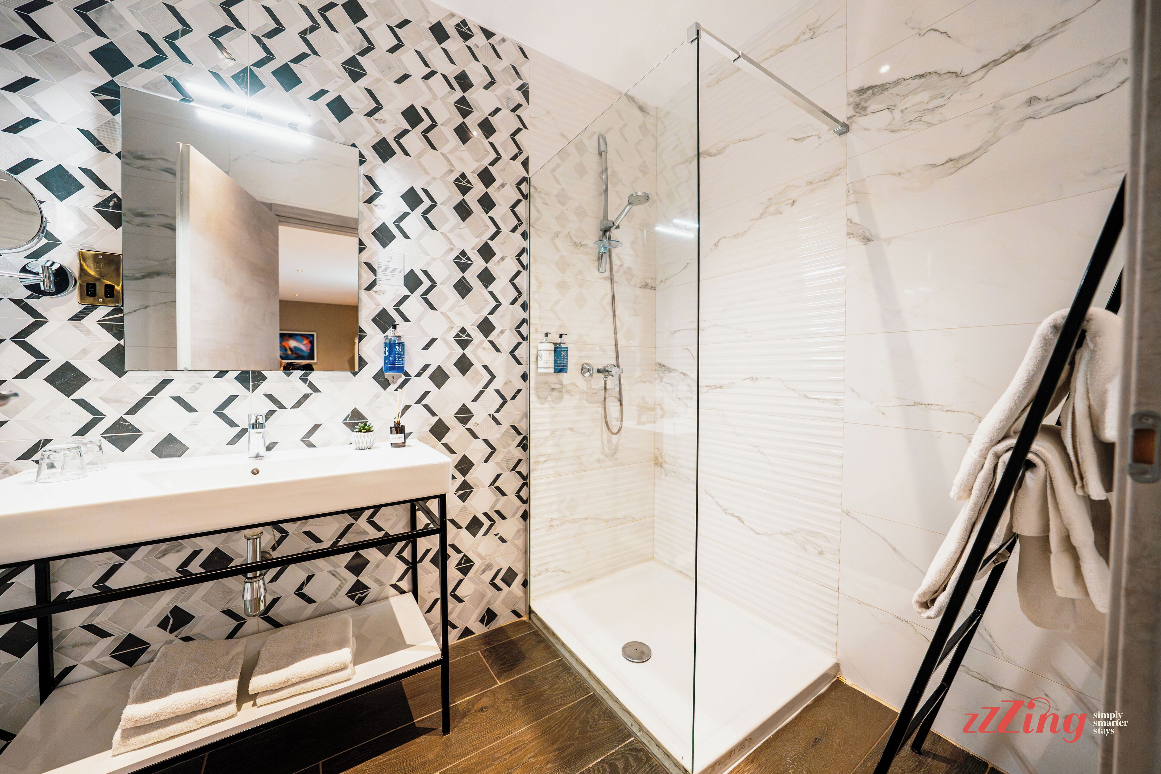 studio suite (family suite) | bathroom | shower, rainfall showerhead, free toiletries, hair dryer