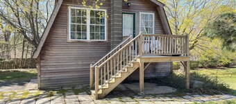 Walk to Beach! Modern Carriage House - Near Town - Deck, Fire Pit & Grassy Lawn
