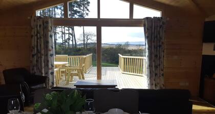 2-bedroom family friendly lodge in private woodland with luxury sauna....