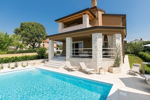 A heated pool - Gorgeous newly built villa with private pool and garden in a quiet and peaceful surrounding near Poreč. Pets allowed. (Mekisi Kod Vizinade)