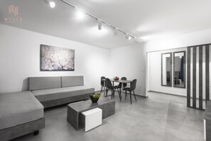 Departamento Deluxe | Sala de estar | Televisión 