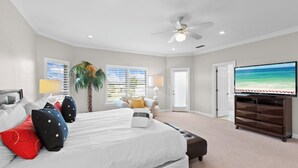 A bedroom with a bed, a ceiling fan, a TV, and a window with blinds. - Siesta Del Sol- Lakefront, Destiny West, Private Pool, Tennis, Fitness! (Destin)