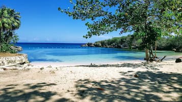 Beach nearby, sun loungers