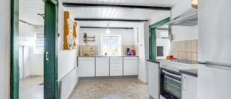 Fridge, stovetop, coffee/tea maker