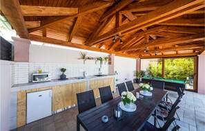 Outdoor dining - Enjoy an unforgettable vacation in this XXL vacation home with heated pool. (Zaton)
